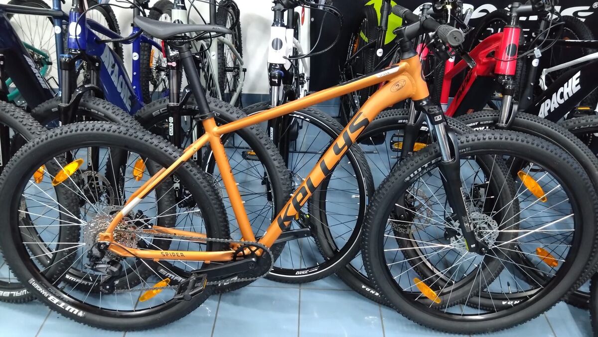 Oranžové horské kolo Kellys